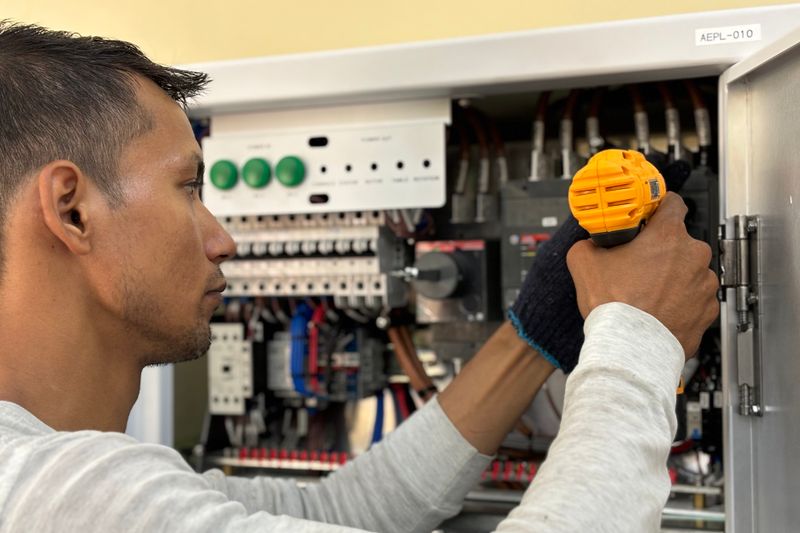 an electrician doing his job